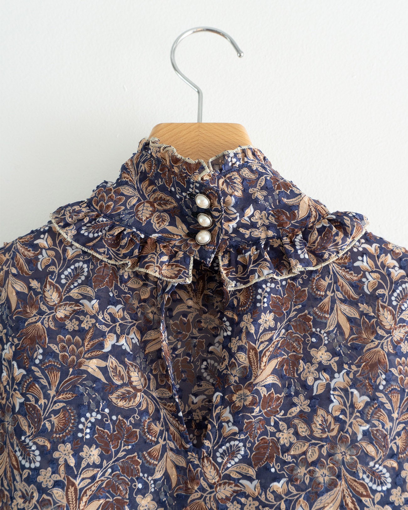 floral sleeveless blouse