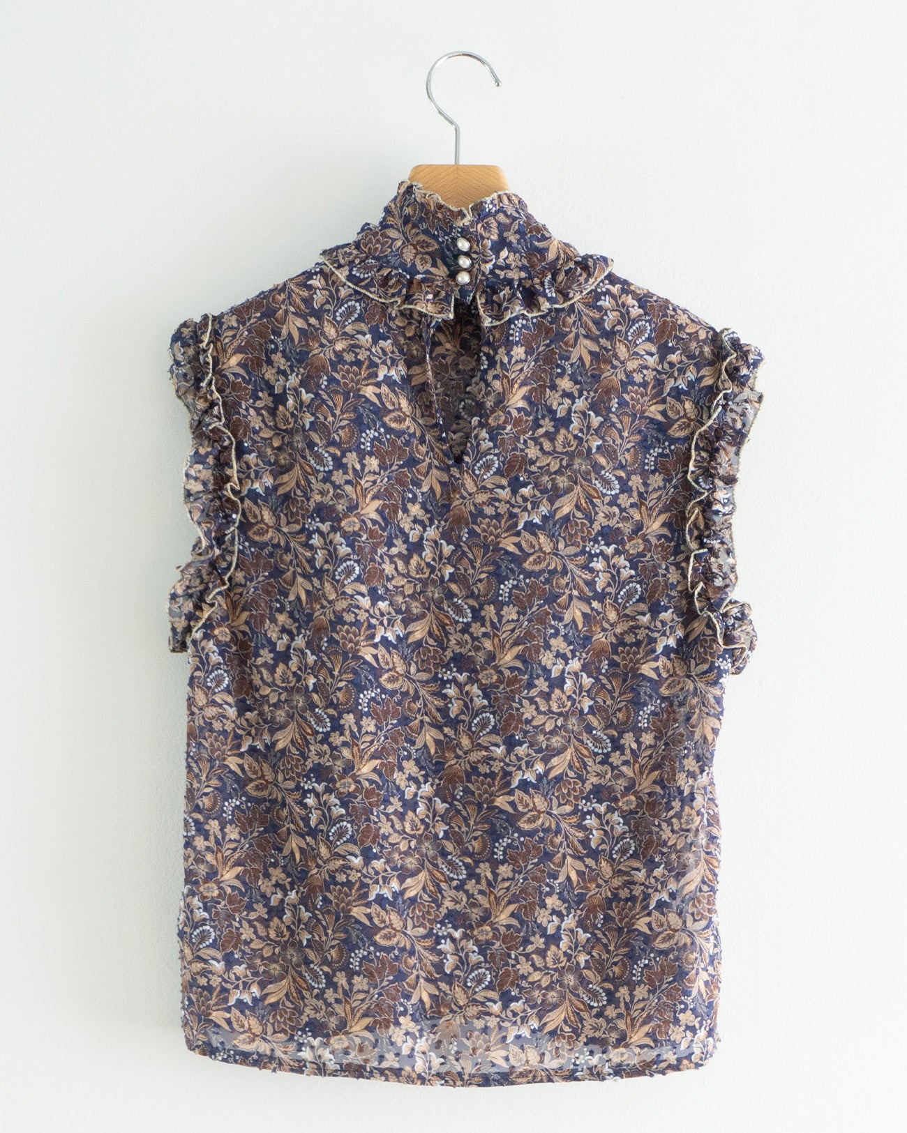 floral sleeveless blouse