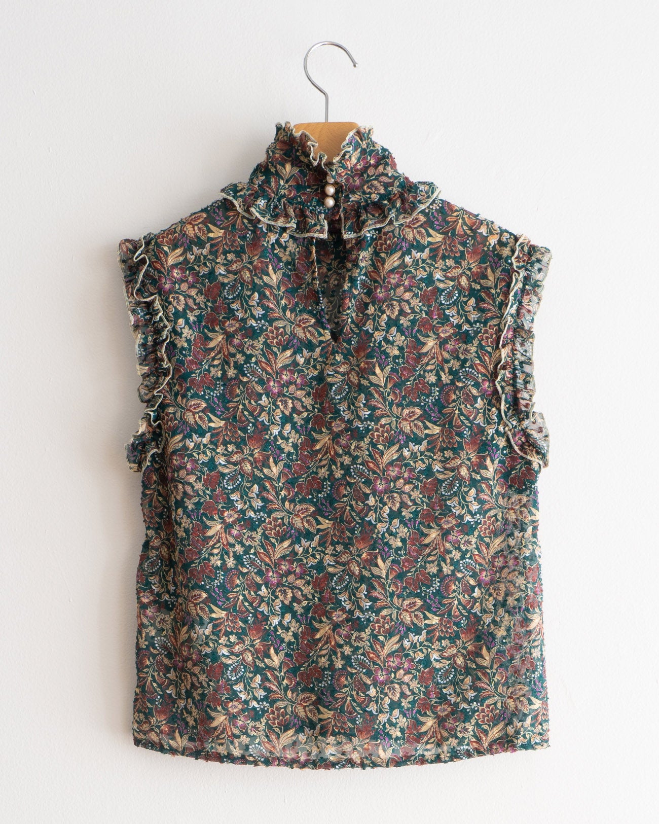 floral sleeveless blouse