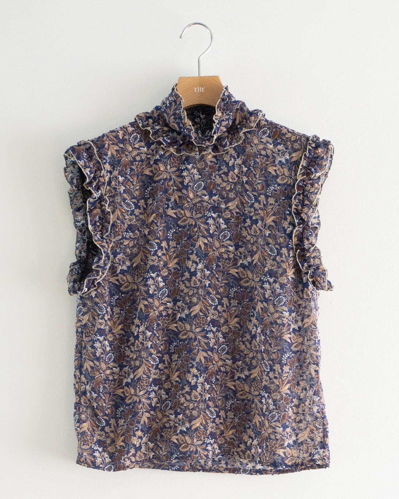 floral sleeveless blouse