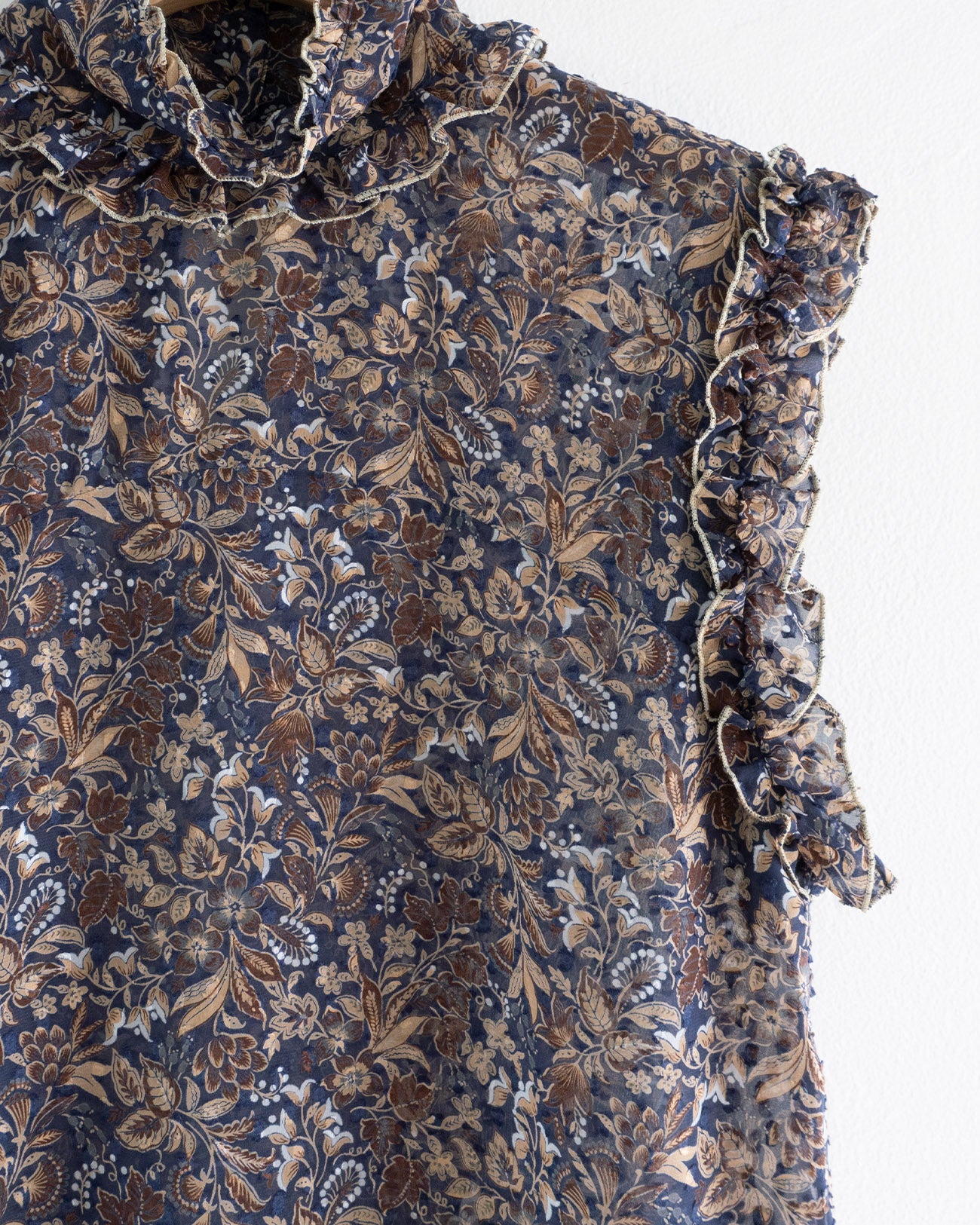 floral sleeveless blouse