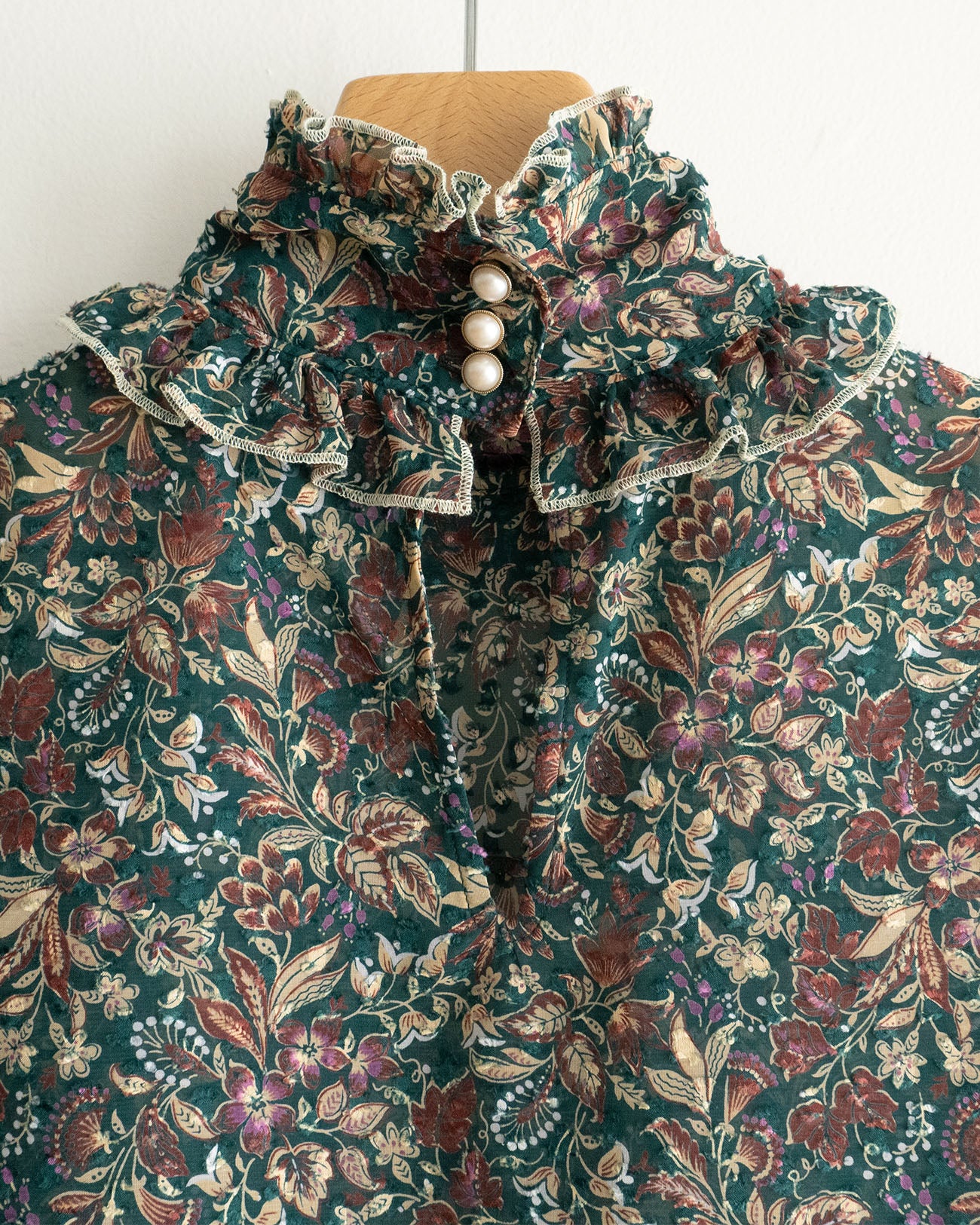 floral sleeveless blouse
